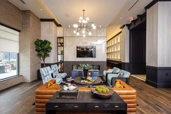 A living room filled with furniture and a large window